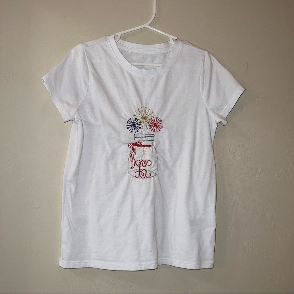 $5 Add On C Monogram White Tee with Embroidered Fireworks Design